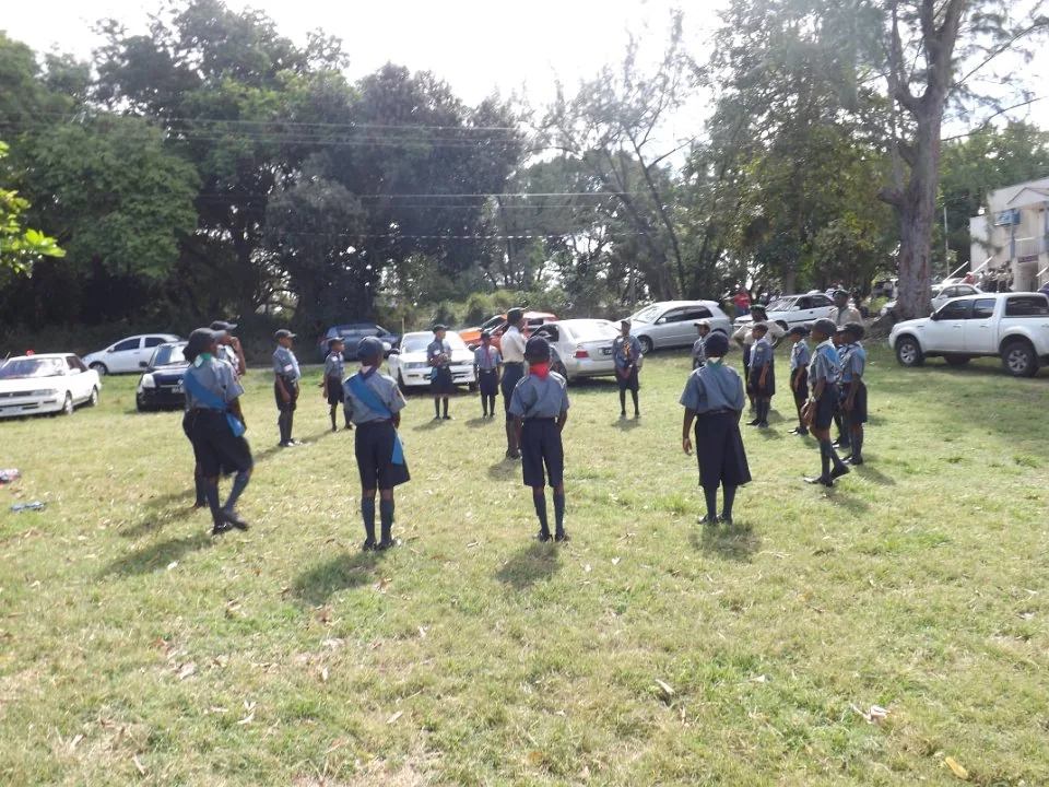 Cub Scouts taking part in an outdoor training activity.